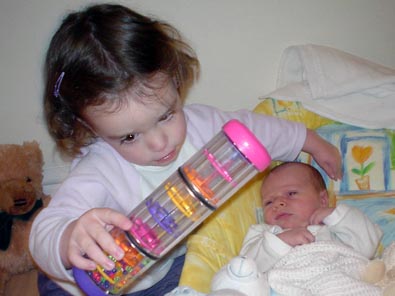 lottie showing ben a rattle